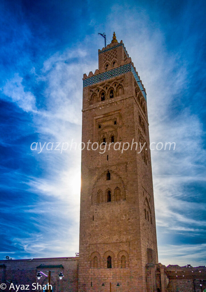 Historic Mosque Minaret Under Blue Sky – Islamic Architecture Photography | Photography by Ayaz