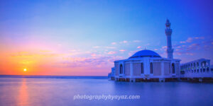 Mosque on Water at Sunset – Islamic Architecture Coastal Photography Photography by Ayaz