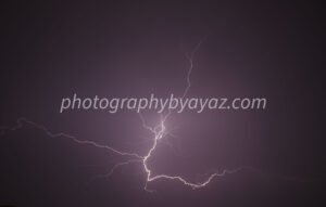 Dramatic Lightning Bolt in Purple Sky – Storm Fine Art Photography  Photography by Ayaz