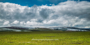 Stormlight Over Snow Peaks – Fine Art Landscape Photography for Wall Decor
