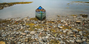 Canoe at Rest – Fine Art Shoreline Photography for Tranquil Wall Decor